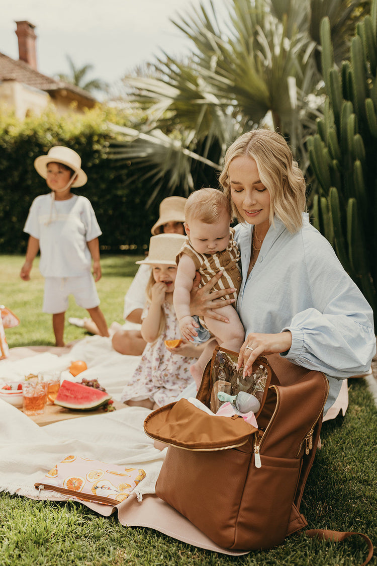 OiOi signature nappy bag in black, showcasing style and functionality for modern parents