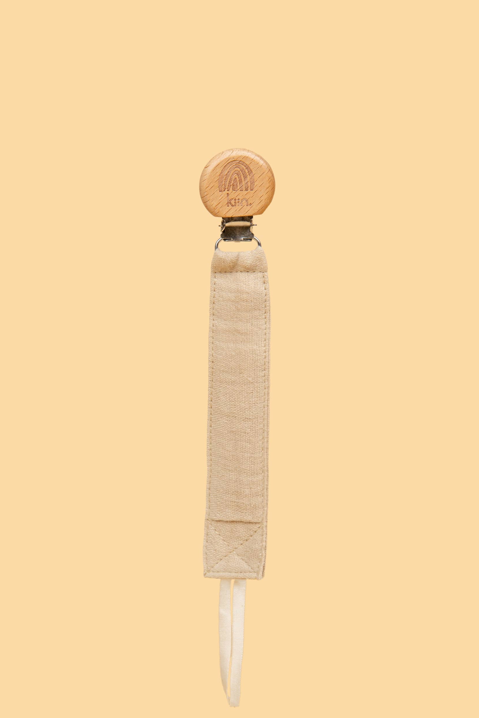 Kiin eco-friendly cotton dummy clip ivory in use - beige