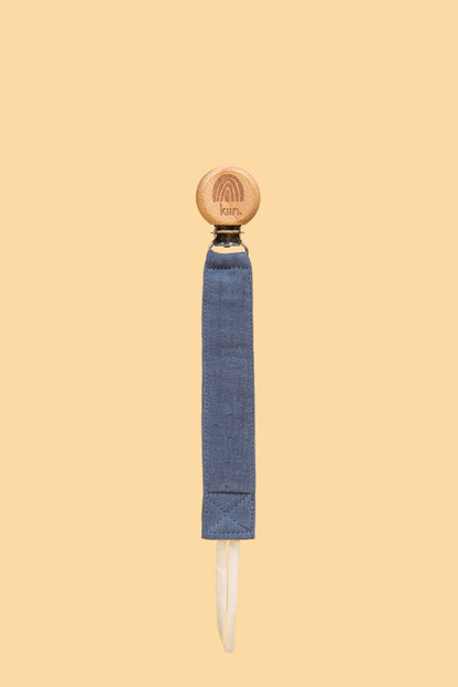 Kiin eco-friendly cotton dummy clip ivory in use - blue