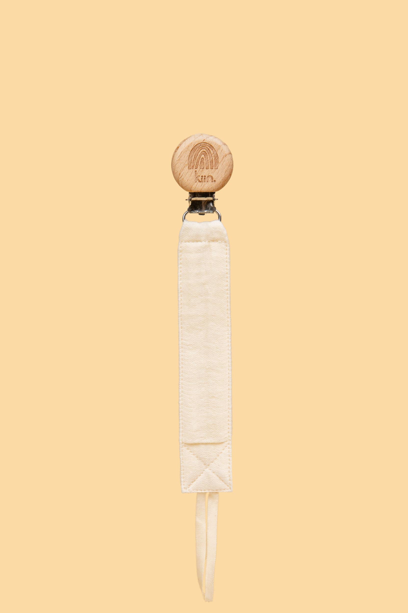 Kiin eco-friendly cotton dummy clip ivory in use - white